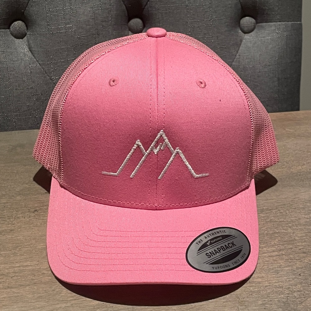Pink Yupoong Snap back Trucker Cap with Mountain Graphic.  Never Worn.